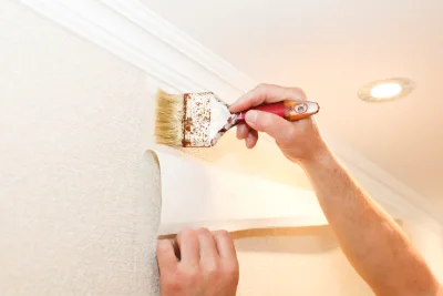 Pose de papier peint à la Trinité-des-Laitiers — revêtements muraux et toiles de verre
